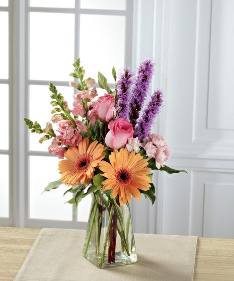 pastel floral arrangement in pink and orange