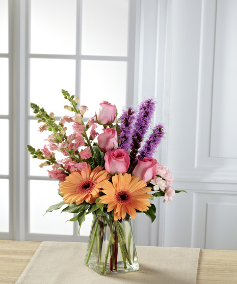 pastel floral arrangement in pink and orange